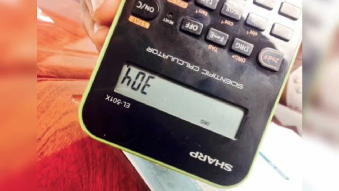 Old school calculator on a desk — the origin of the 304 upside down trick