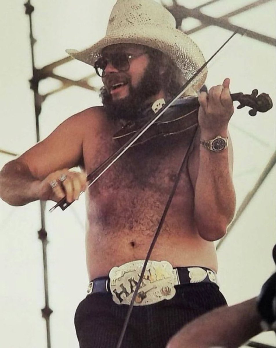 I believe this photo was taken during Hank Williams Jr.’s second reign as Intercontinental champion - hang on, being told that’s just his regular fucking belt.