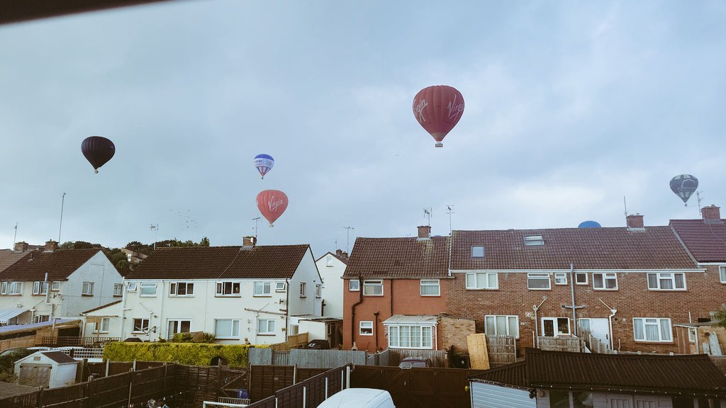 BSballoonpics's tweet photo. Balloons flying over Kingswood for the 1st morning Mass Acsent just before it started to rain! (Friday August 11th 2023) #BristolBalloonFiesta2023 @bristolballoon https://t.co/u2ozdXfnwf