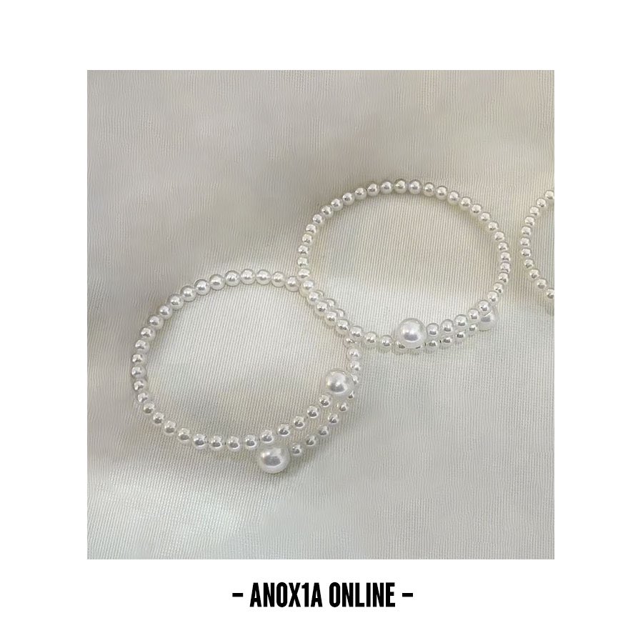 Adjustable Aurora Freshwater AK Pearl Bracelet – a blend of modern elegance and classic allure. Experience the charm of nearly round, almost flawless pearls from Guangdong, China. #an0x1a #an0x1aonline #PearlBracelet #FreshwaterPearls #ChineseAkoya #AdjustablePearlBracelet