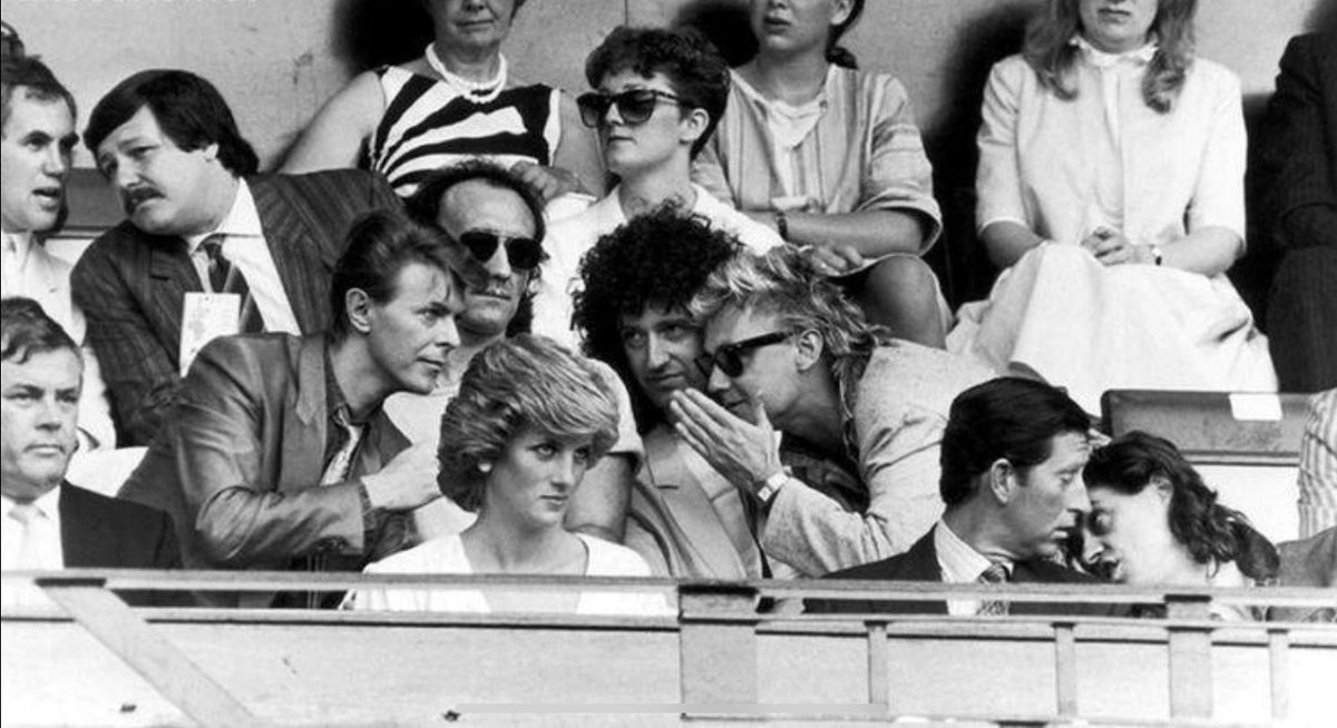 Her smirk says she hears their whispers…Caption this…