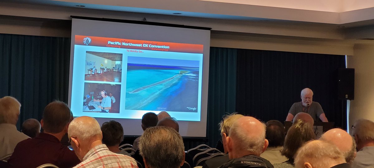 NYCARE_Wellness's tweet photo. Still the 1st presenter is sharing his DX Expedition experience. Here are a few of photos over the years. #PacificNWDXConvention #NewWestminster #AmateurRadio #HamRadio #ICOMcanada #ICOMamerica #ICOMworldwide https://t.co/AQEZIhH0WC