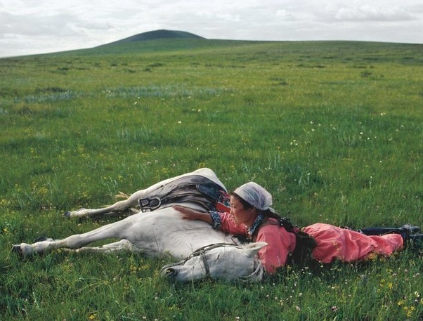 Female fighter horse training for the militia, Inner Mongolia,1979 by photographer Eve Arnold #WomensArt