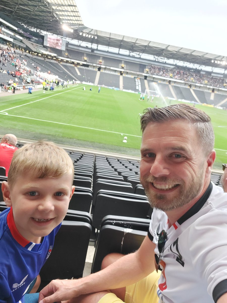 Caught the bug last year,  so got season tickets this year! New tops for me and the boy. First home game, 3 points, 2 league wins from 2 games, is it too early to say we are going to win the league?! #MKDons #MKArmy