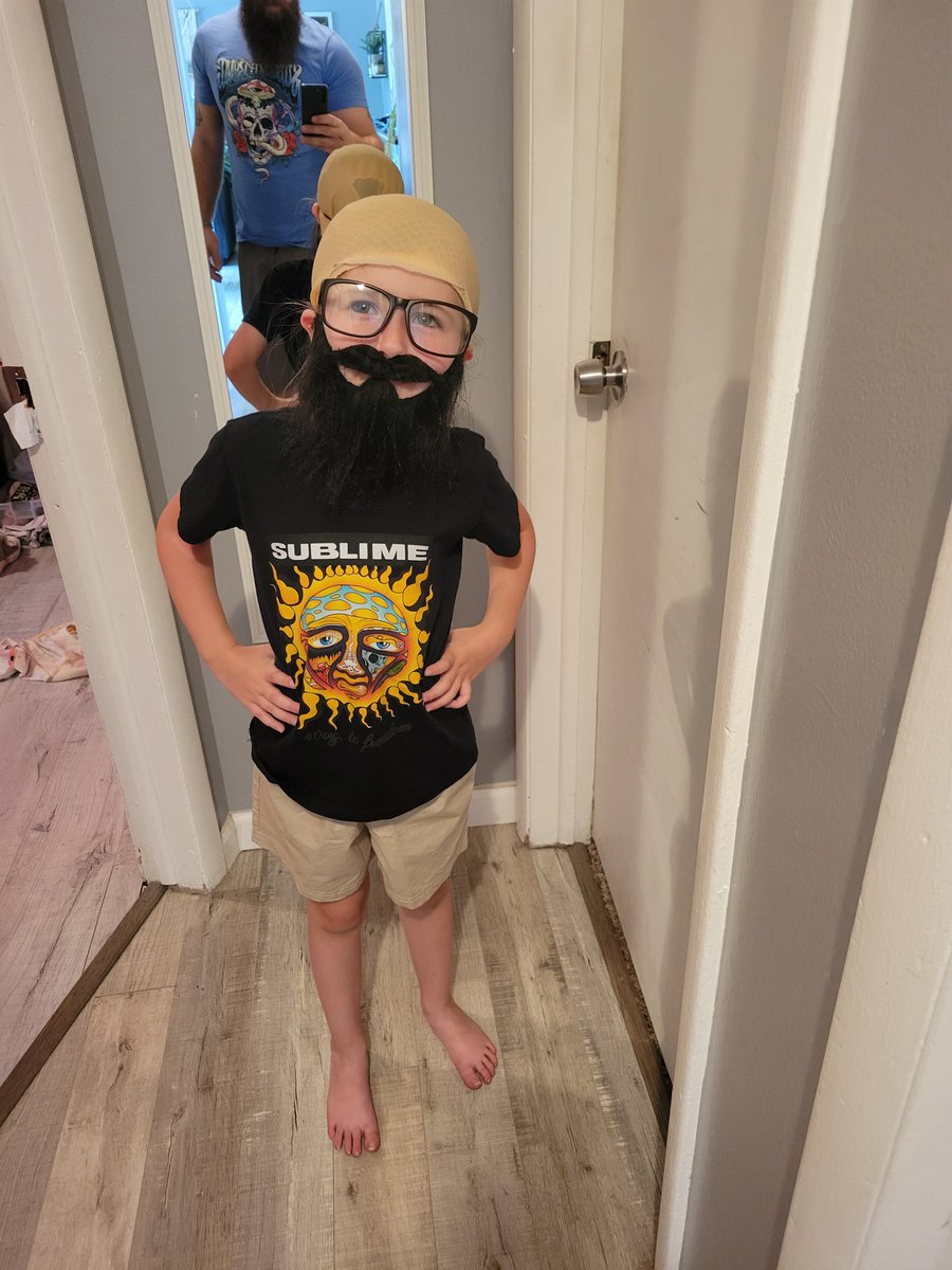 Spiya_Dad's tweet photo. It's like looking into a cuter mirror, she is dressed up as daddy 🤣 https://t.co/2YToDqc4Eo