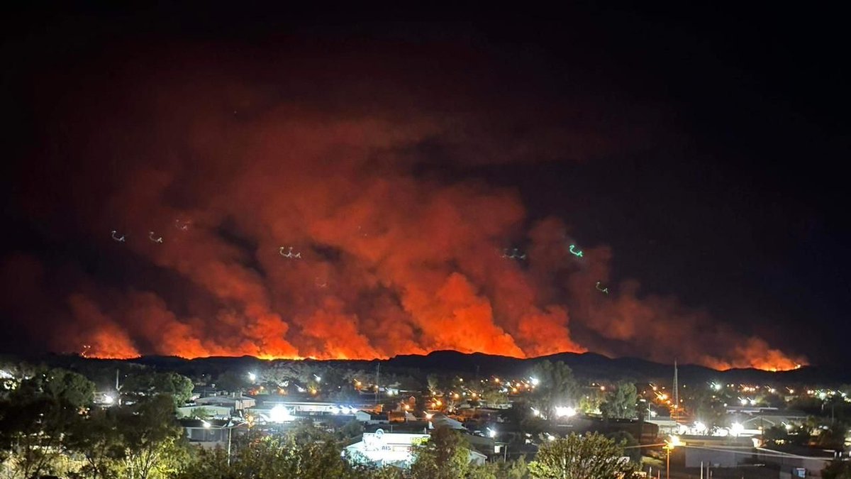 Images from overnight of the buffel grass wildfire on the edge of Mparntwe Alice Springs. Ominous times with huge fuel loads across Central Australia. A huge warning of what may await if drying and warming conditions continue across the region going into summer. @tanya_plibersek