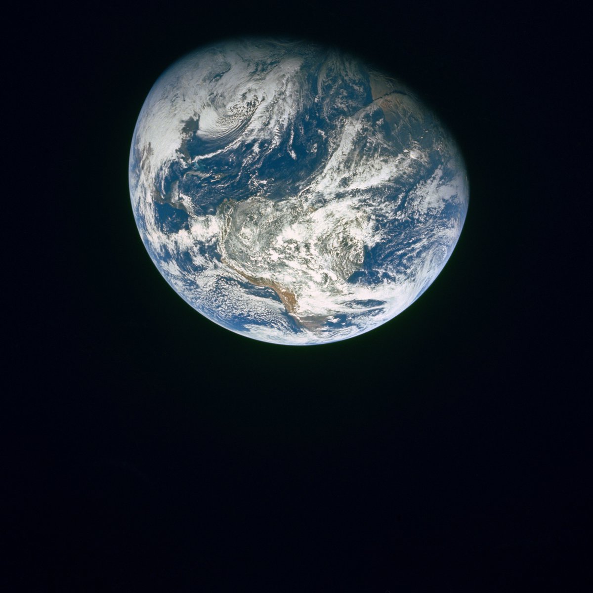 🌍📸 The first photograph ever taken by a human of the entire Earth was captured by the Apollo 8 crew on December 22, 1968, using a 77 mm camera. They were the first humans to witness Earth as a sphere suspended in space.  📷✨ #Apollo8 #EnvironmentalAwareness