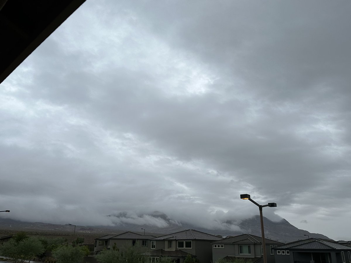 Barely visible #lasvegasstrip and mountains, blanketed in clouds. #hurricanehilary