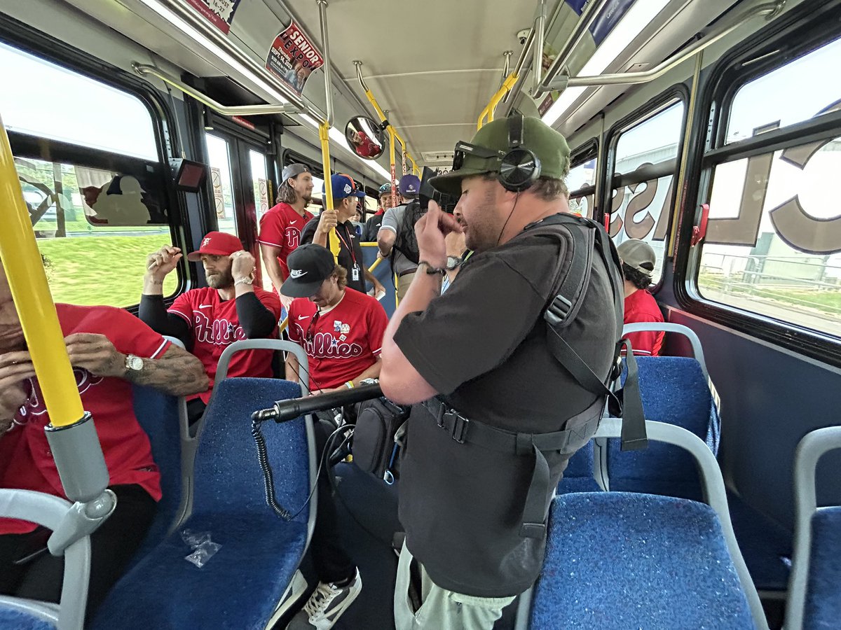Paul_CasellaMLB's tweet photo. The Phillies have landed in Williamsport — and Bryce Harper, Kyle Schwarber and Rhys Hoskins were among those who rode over to the Little League Complex with some of the kids from the Ohio and Czech Republic teams. https://t.co/X4cv9MdFMt