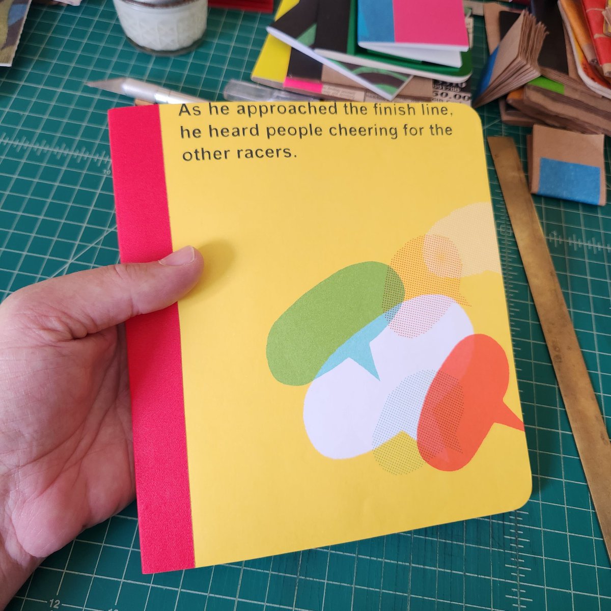 tcanny's tweet photo. Just made an upcycled blank coloring book for my grand using kraft packaging paper and pages from a thrifted copy of #GregPizzoli's great #picturebook Number One Sam. #catchpennybooks #upcycled #ammaking #ambookbinding #bookarts #kidlit https://t.co/Z7itvcohIv