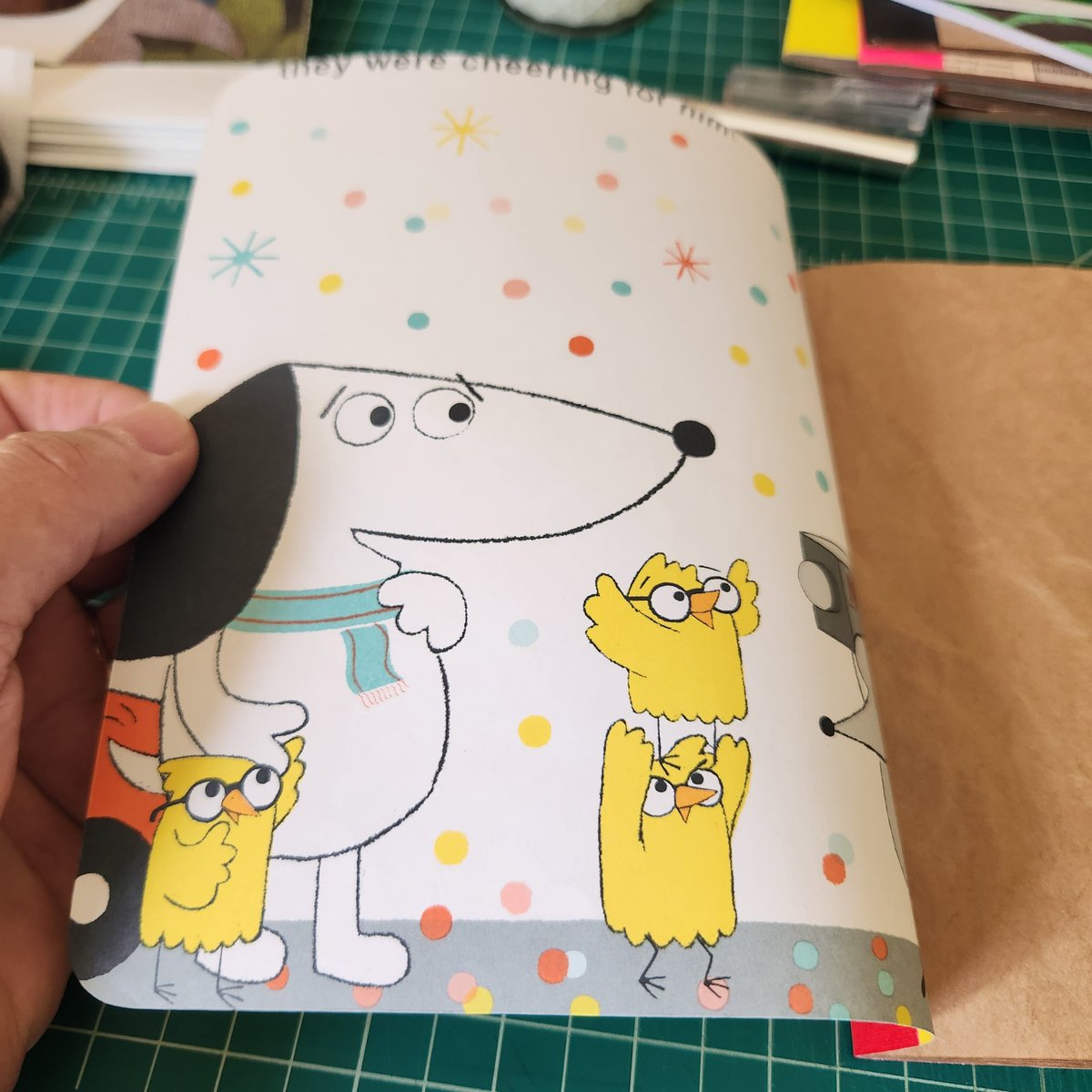 tcanny's tweet photo. Just made an upcycled blank coloring book for my grand using kraft packaging paper and pages from a thrifted copy of #GregPizzoli's great #picturebook Number One Sam. #catchpennybooks #upcycled #ammaking #ambookbinding #bookarts #kidlit https://t.co/Z7itvcohIv