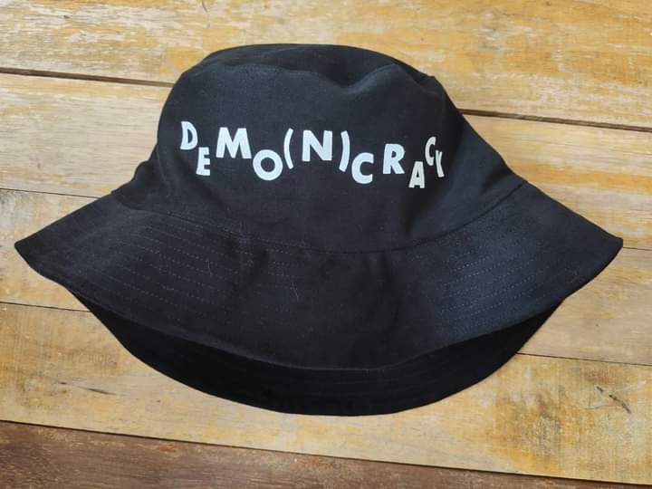 DEMO(N)CRACY BUCKET HAT COLLECTION 
หมวก BUCKET HAT สไตล์คนรักประชาธิปไตยที่อึดอัดกับประเทศไทยที่ประชาธิปไตยมันบิดเบือน..

#smallbusiness #plusonemade #domocracy
#plusonecustom #plusonethailand
 #handmade #archivefashion #crafts #custom #hat #cap #bucketcap
#cyclingcap