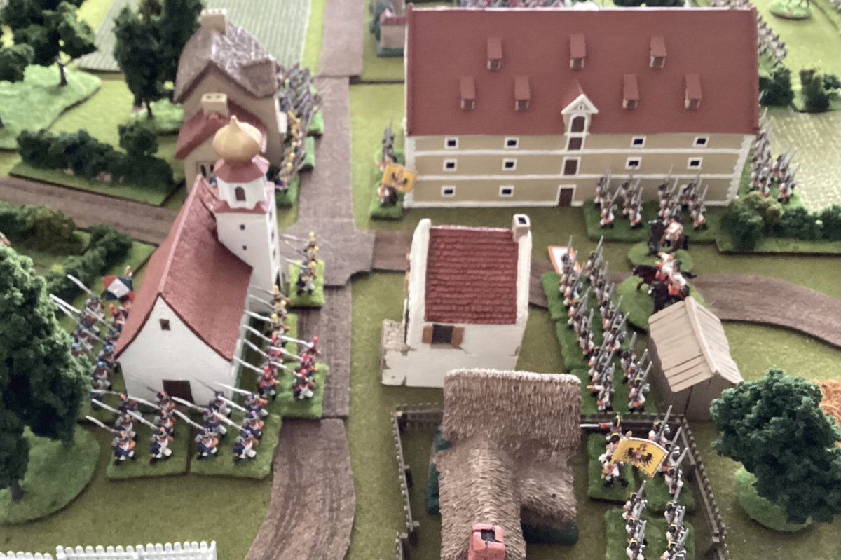 The French cuirassiers and a brigade of Saxons move up to their assault positions. While in Essling the Austrians have fallen back to the granary.