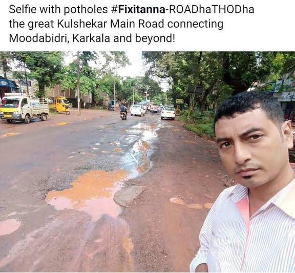 Vaibhav89078460's tweet photo. @nitin_gadkari #selfiewithpotholes https://t.co/N8JT7rxLhL