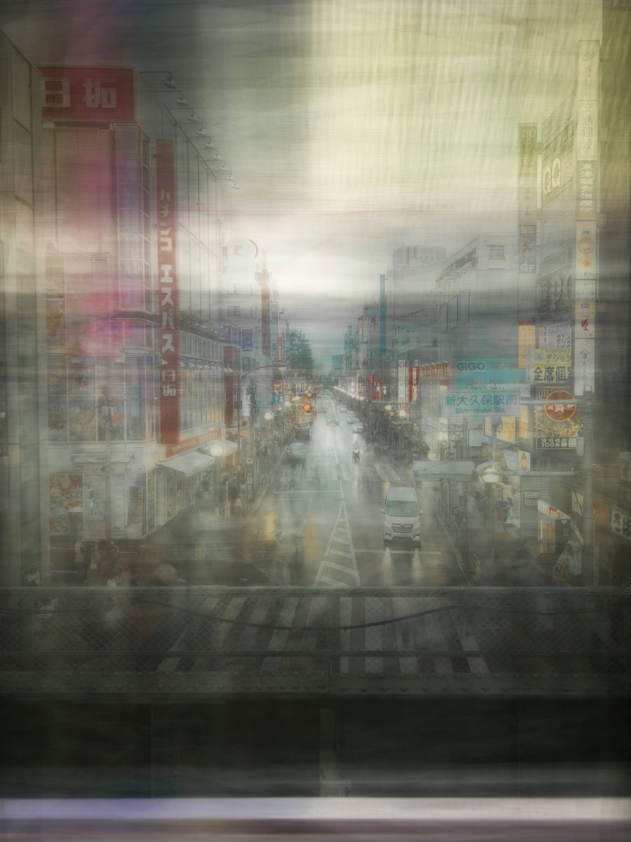 mobilecre8tor's tweet photo. Shot with the #reeheld app by @ReeflexCamera in Tokyo today as a train pulls in to the station on a bridge overlooking this street on a stormy afternoon. https://t.co/DMTO6af65A