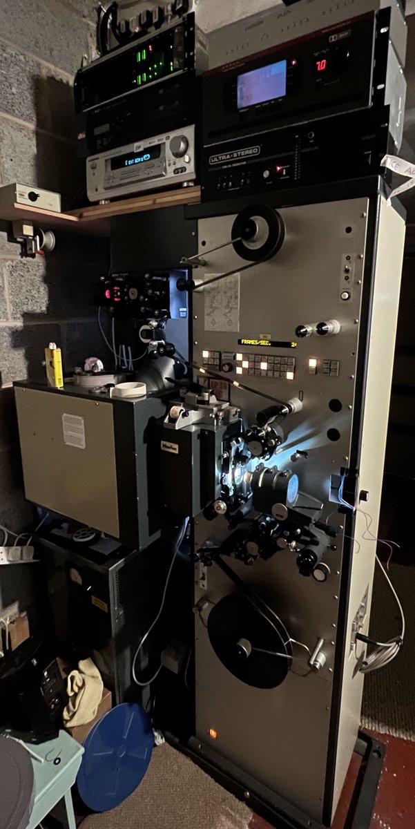 After enjoying Oppenheimer so much, I decided I needed to have something of Christopher Nolan's on 35mm for myself - and managed to get this trailer for The Dark Knight Rises.

Here's some pictures of it being played back on my 35mm projector at home - looks and sounds stunning!