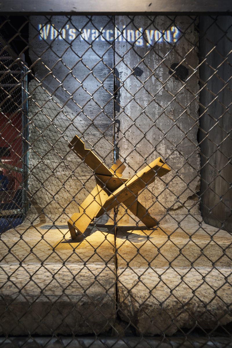 IntlSpyMuseum's tweet photo. Today in #SpyHistory: East Germany began construction on the Berlin Wall, 1961. Explore SPY's exhibit Berlin, City of Spies—a recreation contrasting West and East Berlin during the Cold War. View two original pieces of the #BerlinWall (pictured) on display https://t.co/ng46be4ixK https://t.co/1JpSm7m9b3