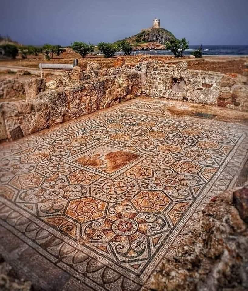 Ancient Roman Mosaic (1st Century AD), at Nora Pula, Sardinia, Italy.

City was founded by Phoenicians, after which it was inhabited by Carthaginians and later by Romans.  Remains of city are mainly from the Roman era. Place has its unforgettable charm thanks to its location, as