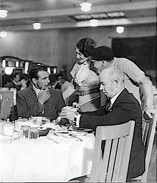 Chico - wearing a stylish beret - introduces his wife, Betty, to Gary Cooper in the Paramount commissary in 1932. The other man is silent comedian Chester Conklin, who wasn't making a film at Paramount at the time. Perhaps he was just catching up with his 'The Virginian' co-star.