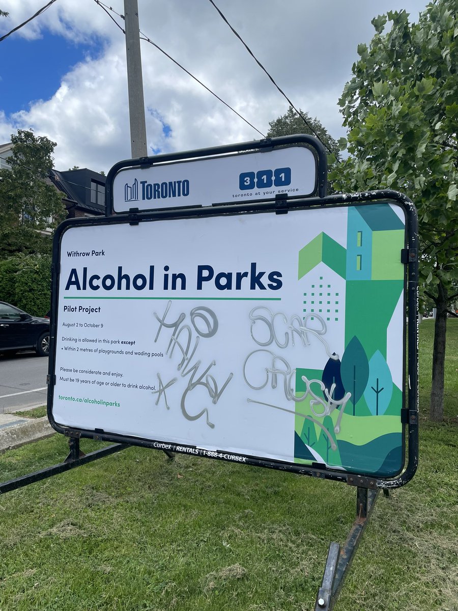 And here we are…making good use of the signage 🙄 #graffiti #freecoluringbook #toronto