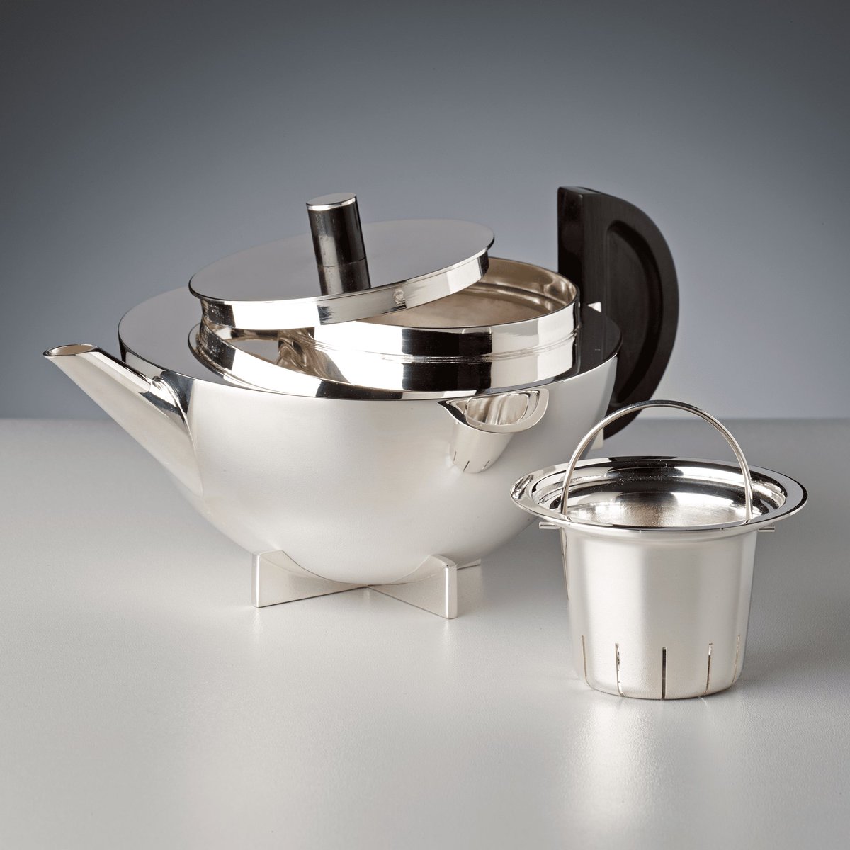 Marianne Brandt's tea extract jug, crafted in 1924, is more than just a functional object; it encapsulates the essence of #Bauhaus #design principles. With its impeccable blend of form and function, this masterpiece serves as a testament to the enduring influence and visionary