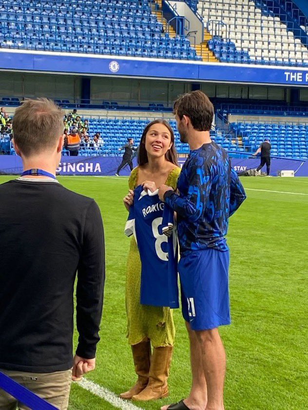 BuzzingPop's tweet image. Olivia Rodrigo with football player Ben Chilwell at the Chelsea vs. Liverpool match.