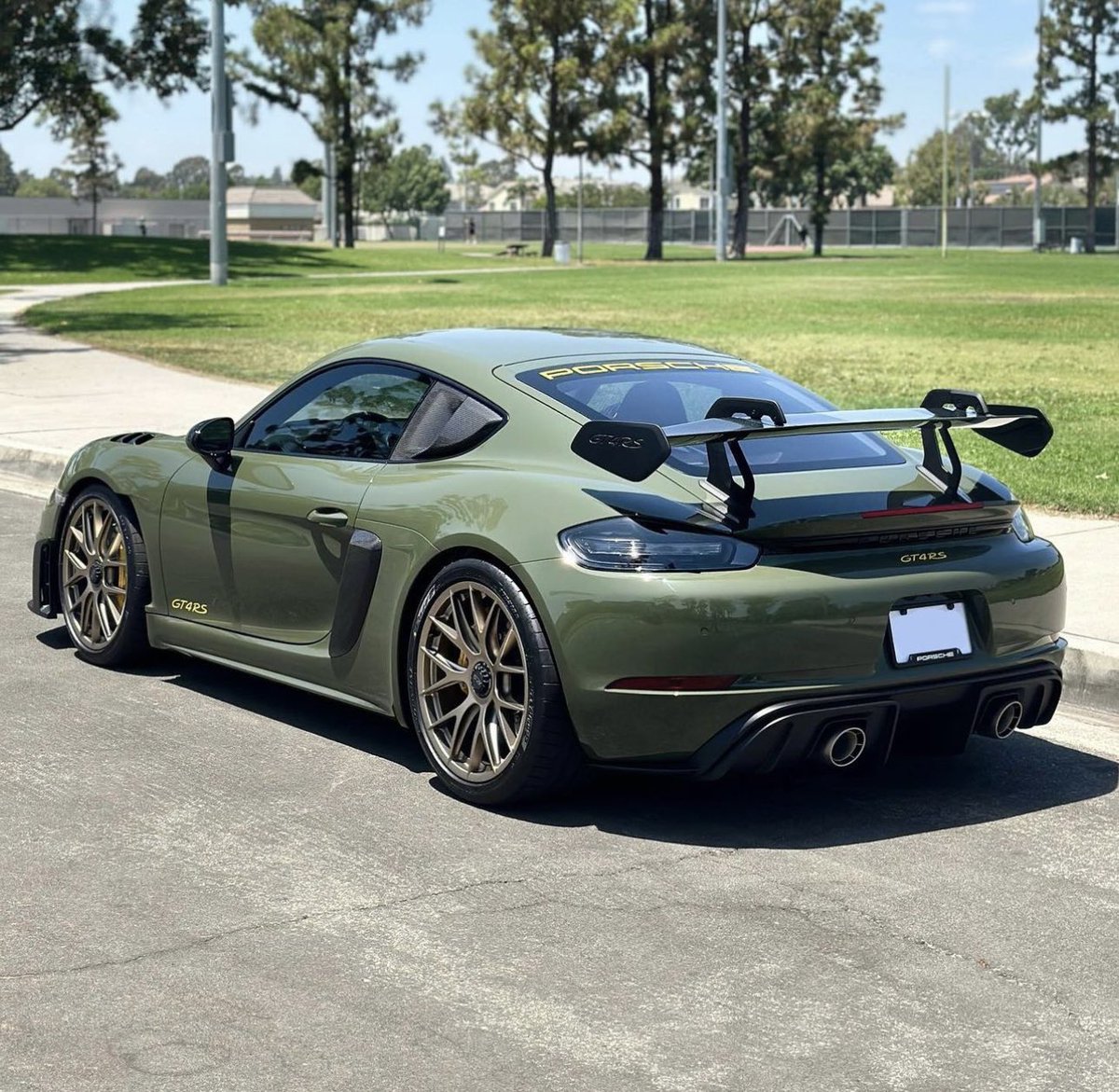 PorscheCIub's tweet photo. Paint-to-Sample Nato Olive Cayman GT4 RS https://t.co/kFTjkAikFQ