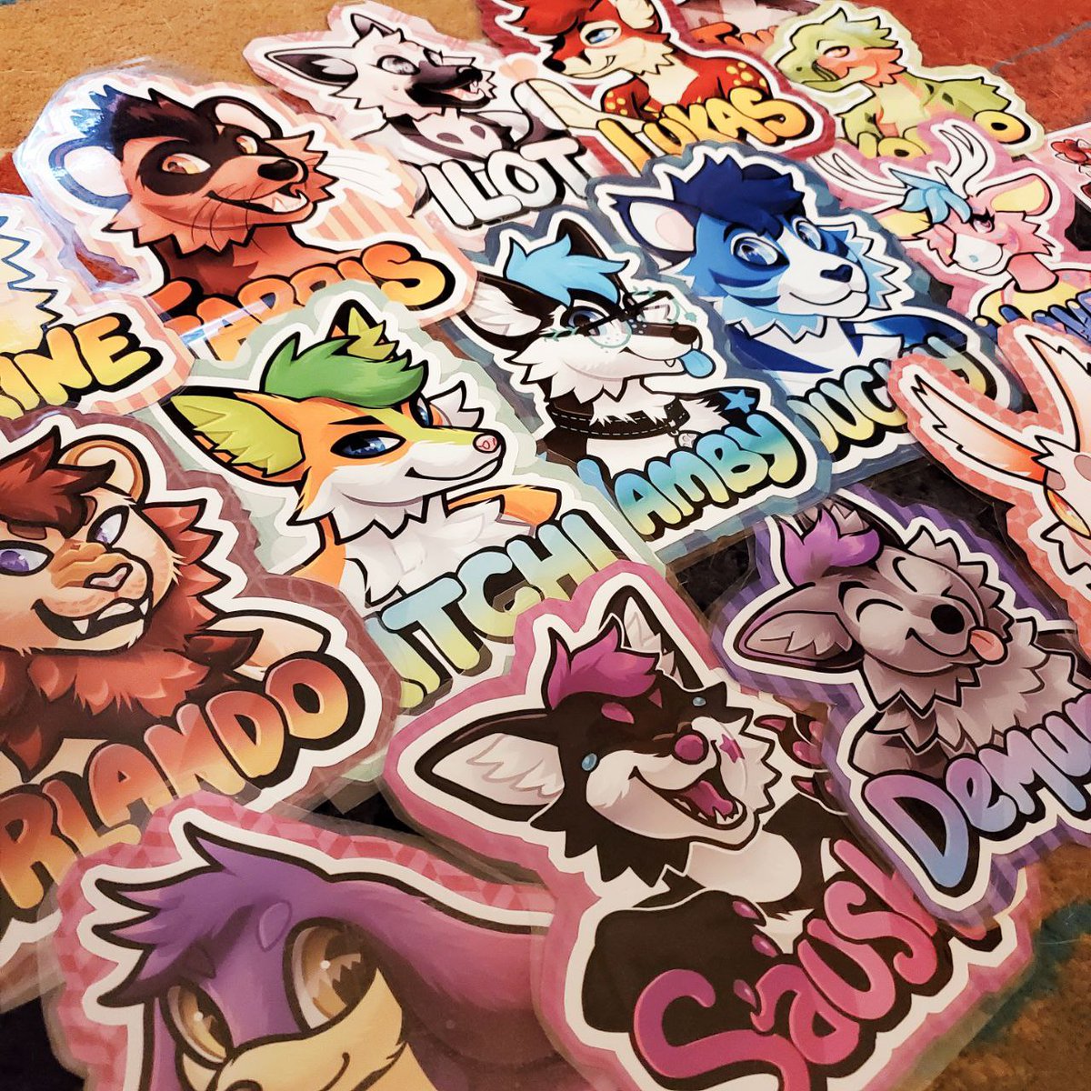 yellow_k9's tweet image. Printouts of recent badge commissions!
