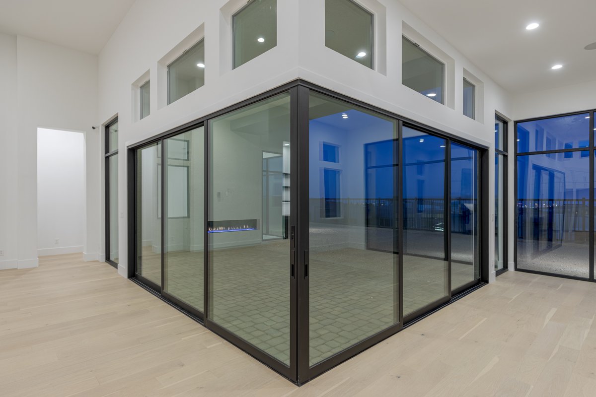 This 90º sliding door is perfect for indoor/outdoor living! #10801WhiteClay • Mesa Ridge • $2,298,800 3,465 SF • 3 Bedrooms • 4 Bathrooms ML#2506449