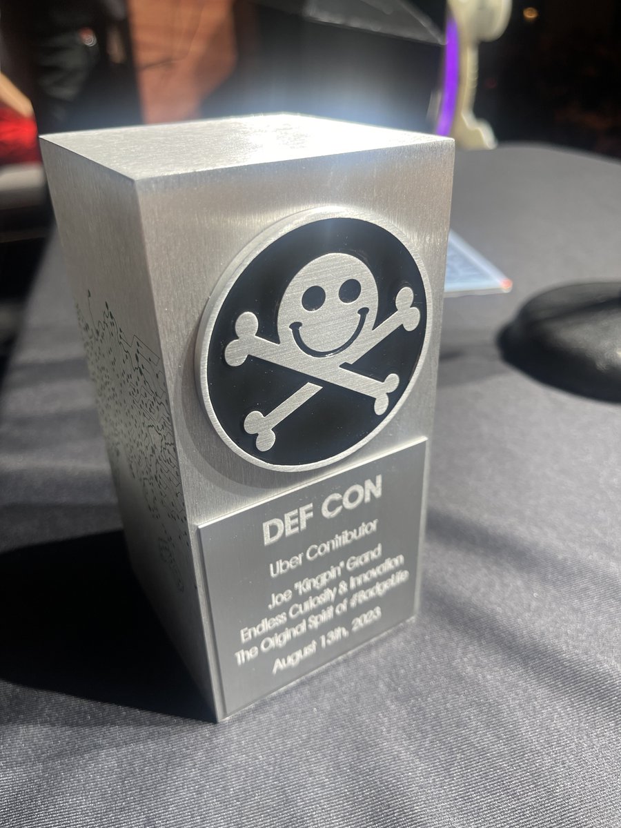 Grifter801's tweet photo. A beautiful salute to @joegrand at DEF CON 31. A lifetime achievement award well earned. #defcon @defcon https://t.co/3GWs5bPerA