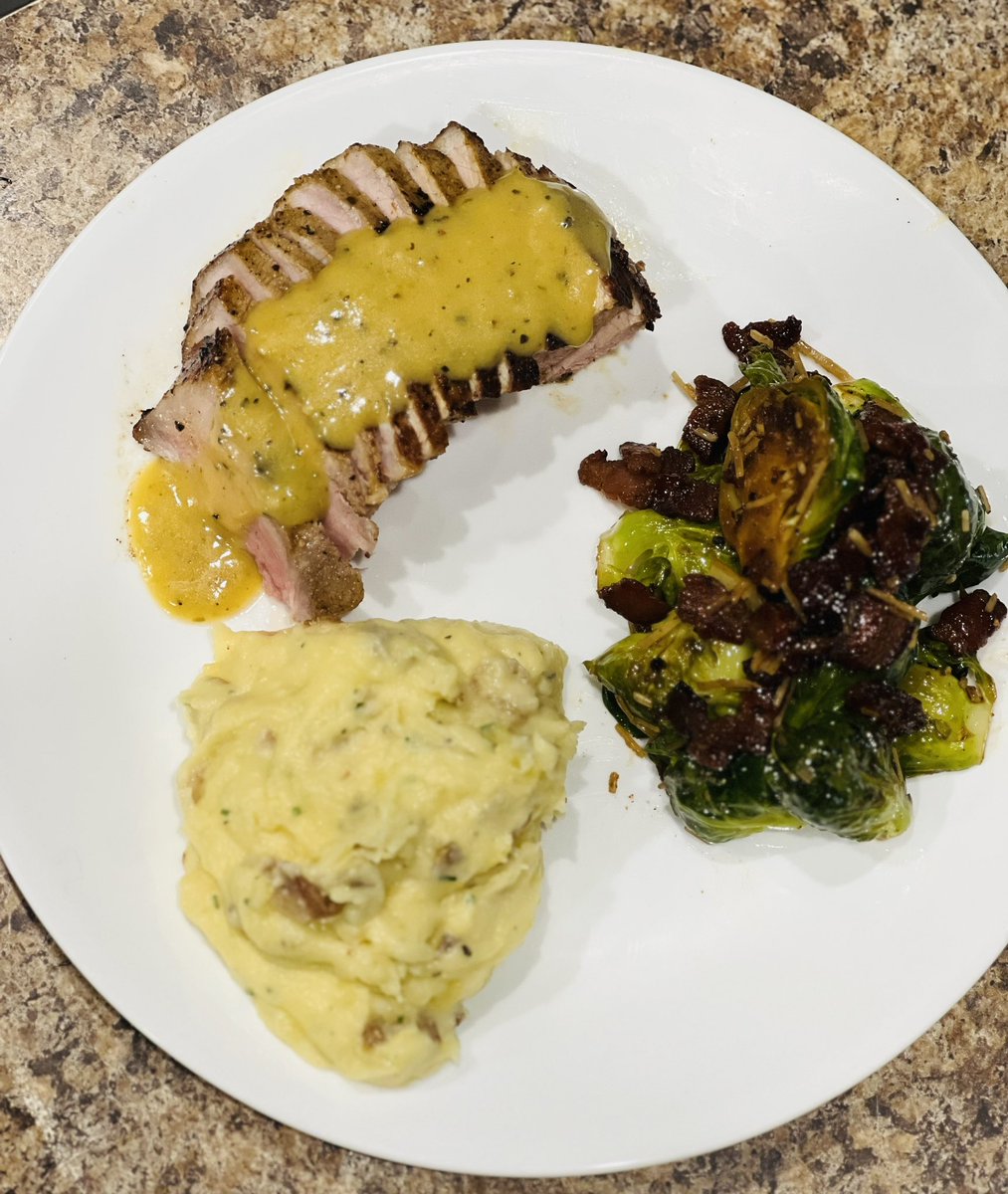 RevRyne23's tweet photo. @Ethan_Mather16’s pig. Lemon pepper pork chop. Sous vide at 140 for an hour. Seared on a cast iron. Smashed potatoes with gouda and chive. Roasted brussels with more local pork, parmesan, and balsamic glaze. Lemon pepper butter pan sauce to finish. 🧑‍🍳 https://t.co/cVxs0wzdCh