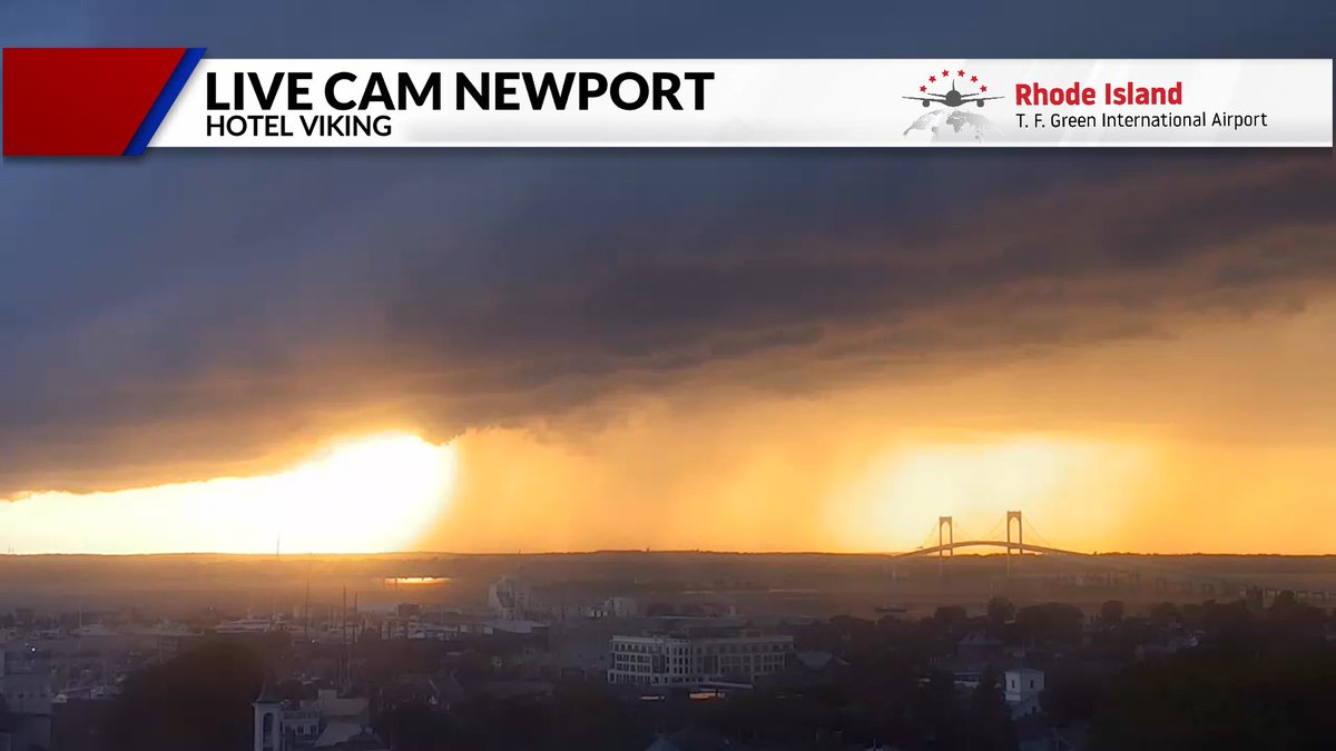 Newport this evening - sun with rain showers in the distance 🌅