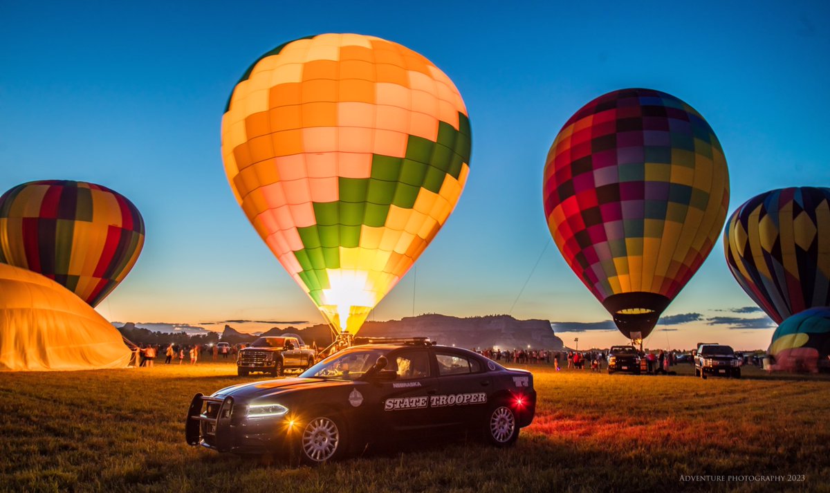 Yesterday closed out the annual #OldWestBaloonFestival in #WesternNebraska. As usual, the event closed out the week with a night glow in Gering. Andrew (from Adventure Photography) caught up with Trp Sporer (#NSP290) and landed this amazing photograph.   #Sunset #CruiserCalendar