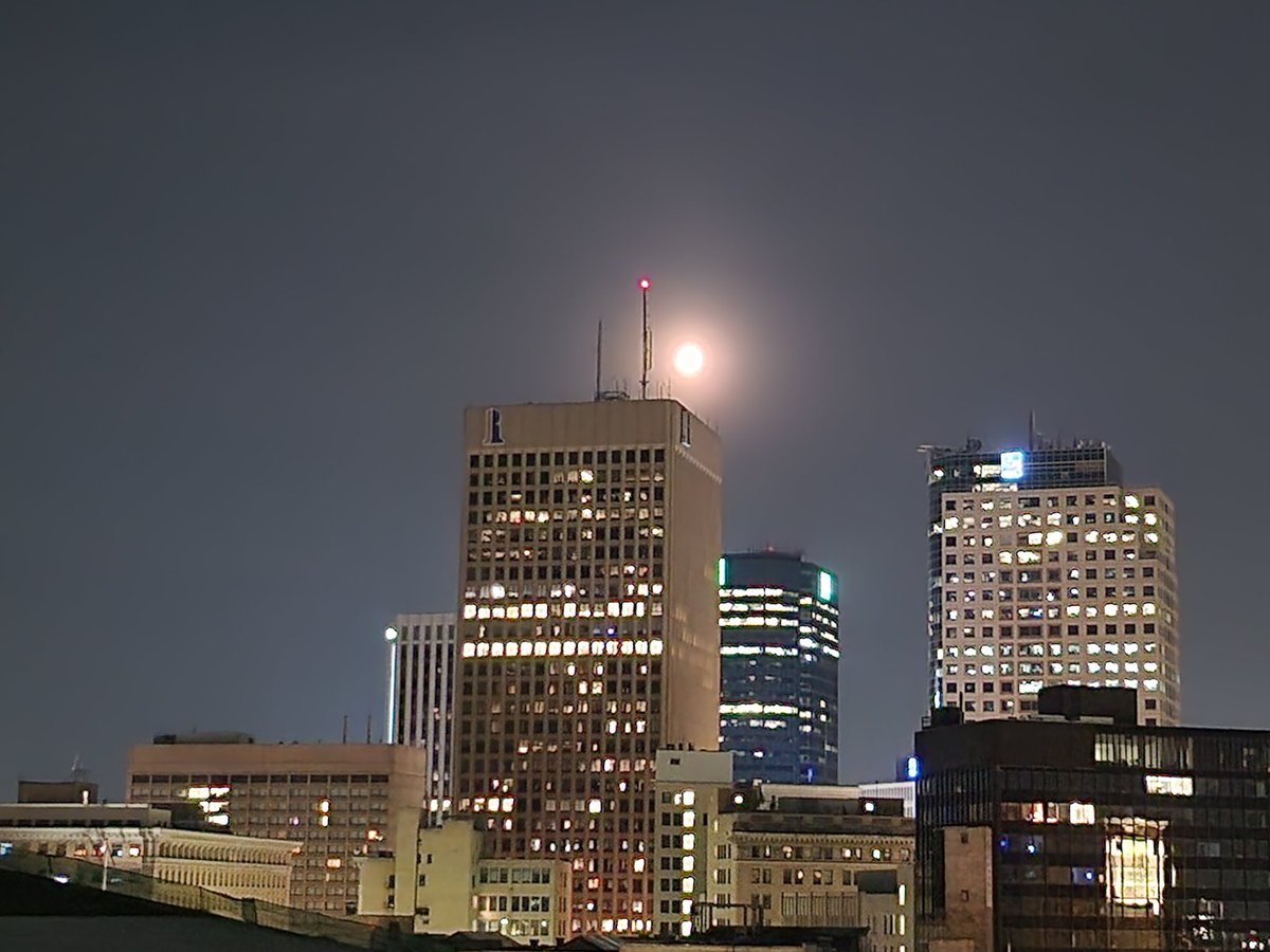 Writing poetry from 7th story rooftop. Somewhere around 3 AM. Hot night. High moon.