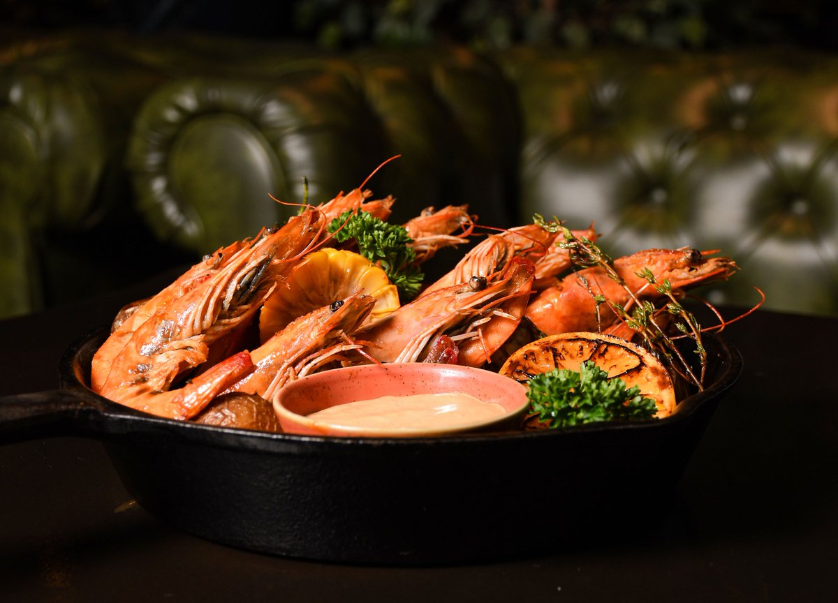 Savor the flavors of summer at Sherlock Holmes!

Delight in 14 succulent prawns sautéed in white grape and garlic butter, complimented with corn on the cob and a helping of baby potatoes.

BD 17.5 Net

+973 3655 1333 | +973 1771 3000

#gulfhotel #bahrain #prawns