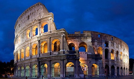 The Colosseum The largest ancient amphitheatre ever built is the Colosseum in Rome, Italy. Construction began under Emperor Vespasian of the Roman Empire and was completed in 80 AD under the rule of his heir Titus, after his death. It was further developed by Emperor Domitian…