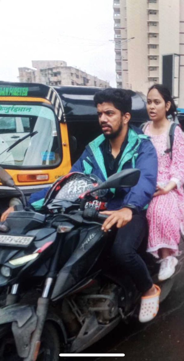Varnil's tweet photo. @MumbaiPolice @MTPHereToHelp This is the photo of the guy. My number is for a car and I get finned for NO HELMET https://t.co/RKWlp7hxrw