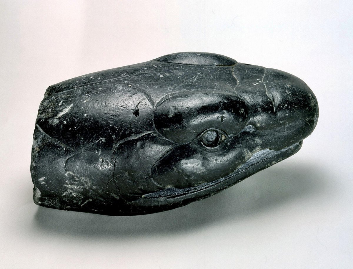 Snake head made of serpentine. Period / Findspot: Postclassic, central Mexico. Date: c. 1200-1520 AD. Collection: Dumbarton Oaks Museum.
