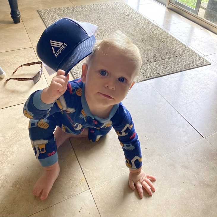 BuildANDRES's tweet photo. We LOVE seeing little ones in #ANDRES gear! Check out this little guy who swiped an ANDRES hat from his grandfather for a quick picture. Think this little guy has a future in construction with his construction themed pajamas? We sure hope so! https://t.co/UFKwEi1Cj3