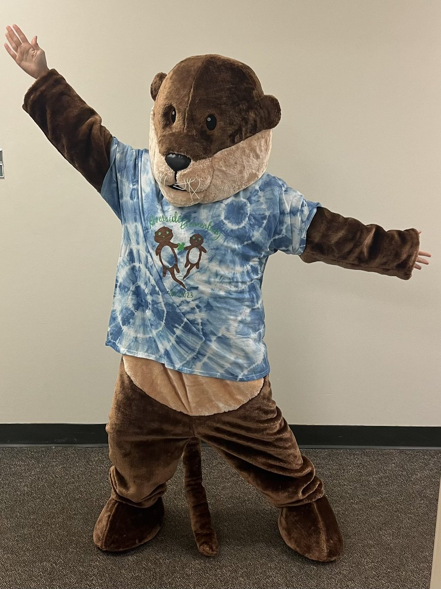 River the otter is getting excited to welcome our Riverside students back to school on Thursday the 17th.💚🍀 #BetterTogetherDCS