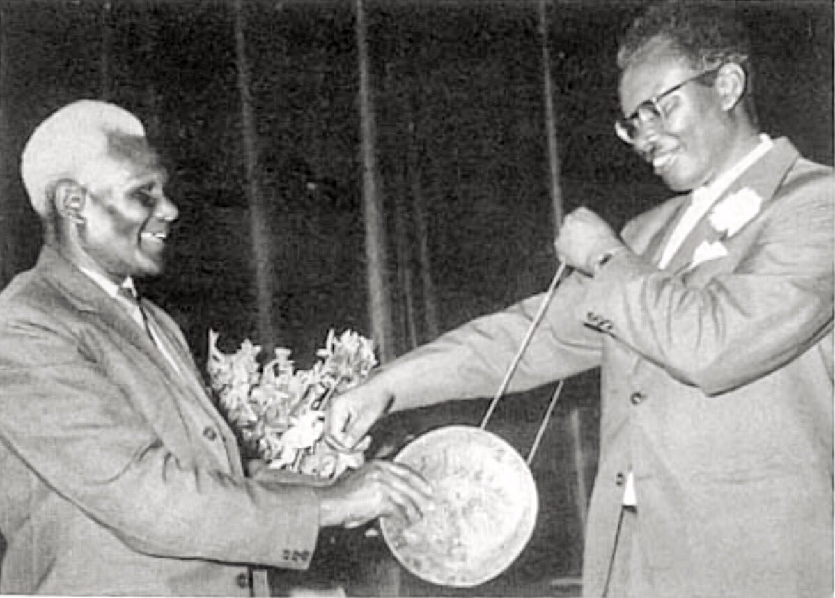 HistoryKE's tweet photo. The nation has lost Harris Mule, a distinguished former PS for Ministry of Finance and Planning, known for his honesty and sense of industry.

Born in Mbooni 87 years ago, the Harvard-trained economist is pictured here on his wedding day receiving a traditional stool from his father, Philip Mule.

Harris was also the brains behind the Moi-era District Focus For Rural Development policy.

Harris had two honorary degrees - a Doctor of Laws Honoris Causa from York University, and a Doctor of Philosophy (PhD) Honoris Causa from Kenyatta University. Harvard Univrsity also conferred him a Distinguished Alumni award.

Between 2013 and 2022, Harris was the founding Chancellor of Lukenya University.

May his soul rest in peace.