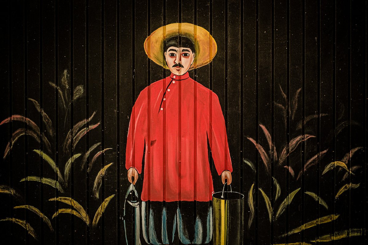 SPDFoto's tweet photo. Caged Farmer https://t.co/Y51HHRIuZ6