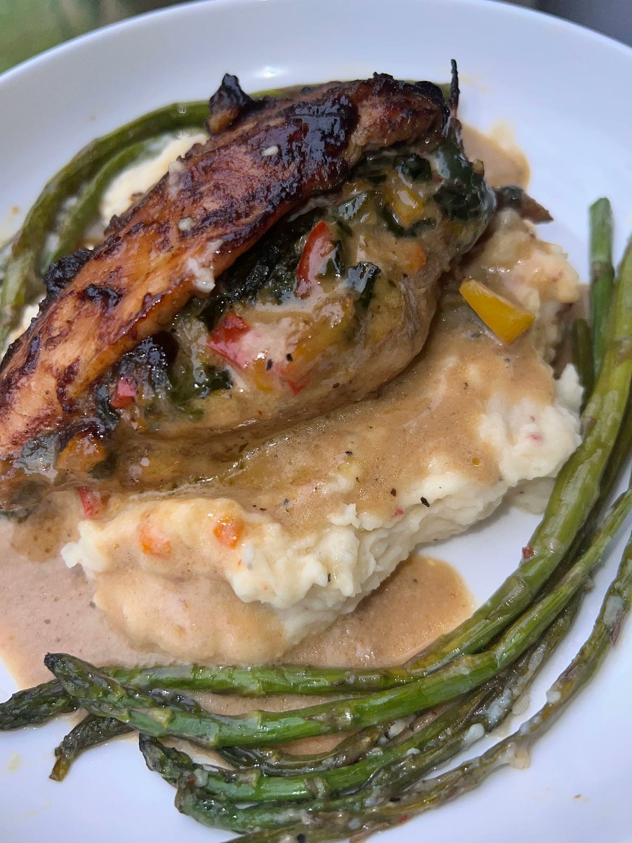 I'm always experimenting with something new. This is Jerk Stuffed Chicken with Spinach and Sweet Plantain Mash and a Coconut Cream Sauce! ✨
