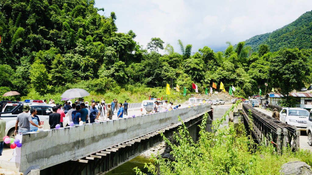 felix_bamang's tweet photo. It brings me immense pride and honour to dedicate the RCC Double-Lane steel composite bridge over Panyiu River in #Nyapin, along with four other Double-Lane RCC steel girder bridges over Paya, Pani, Patrey & Yachi streams along the Sangram-Nyapin road, to the people of 19th Nyapin Assembly Constituency, #KurungKumey. 
My humble gratitude to the local denizens for their cooperation, and to the PWD, Sangram Division and contractors for successfully completing the bridges.