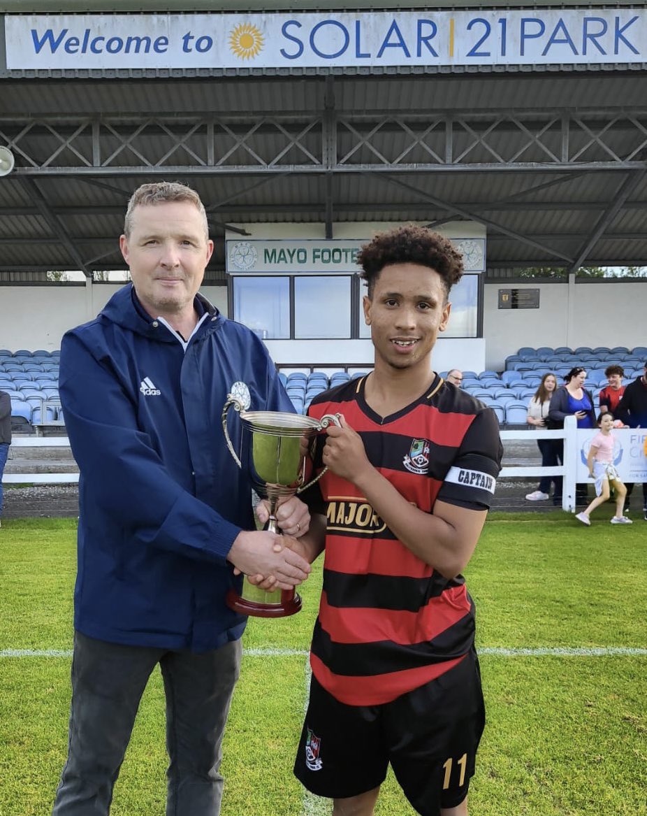mayoleague's tweet photo. Congratulations to Ballyhaunis Town who are the Helen Johnson U18 Division Two Champions after a 5-2 win over Ballinrobe Town in a play-off at Solar 21 Park. 

Martin Kielty from the Mayo League was on hand to present the cup to captain Mohammad Alom https://t.co/gHqHWIqne2