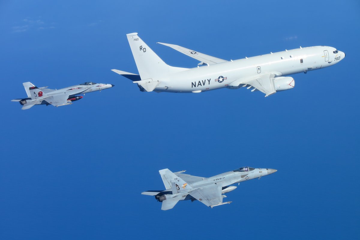 USNavy's tweet photo. #USNavy Photos of the Day: 

1️⃣ #VFA87 and #VFA31 intercept a P-8A from #VP47 over Med @USNavyEurope
2️⃣ A child gets a dental exam and 3️⃣ @navyband performs in Vietnam during #PacificPartnership
4️⃣ #USSAnnapolis returns @nbguam @US7thFleet @INDOPACOM
👉 https://t.co/aZddB6hxYf https://t.co/W5cDBFi9er