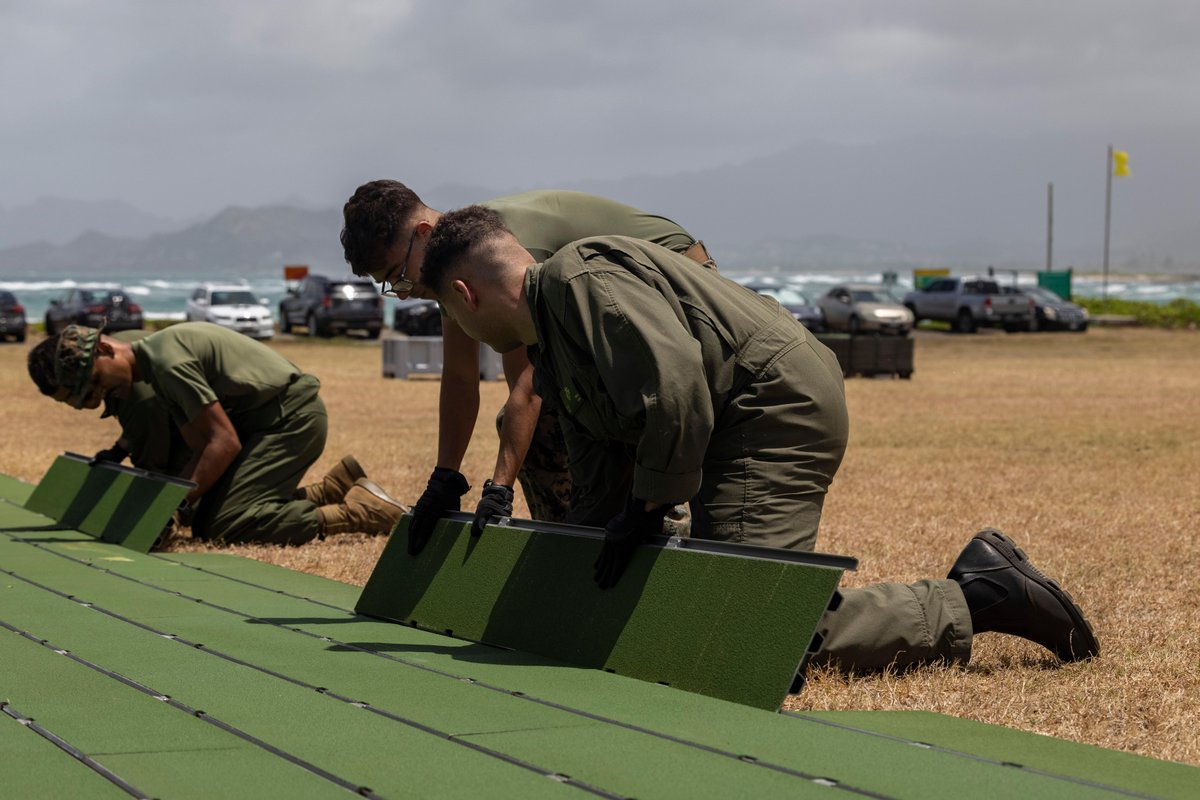 Marines with MWSS 174 install a PE-36 anchor for Prefabricated Surface Aluminum Flat Top Nested (PSA FTN) airfield matting at Marine Corps Base Hawaii.

U.S. Marine Corps photo by Lance Cpl. Hunter J. Jones
