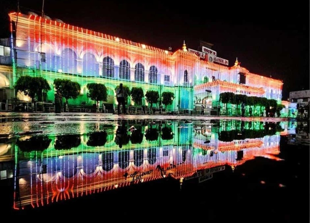 DRM_ASN's tweet photo. On a rainy day evening, the mesmerizing look of Asansol station - on the eve of Independence Day, LED light decoration by Asansol Division. https://t.co/q8tNXDgImk