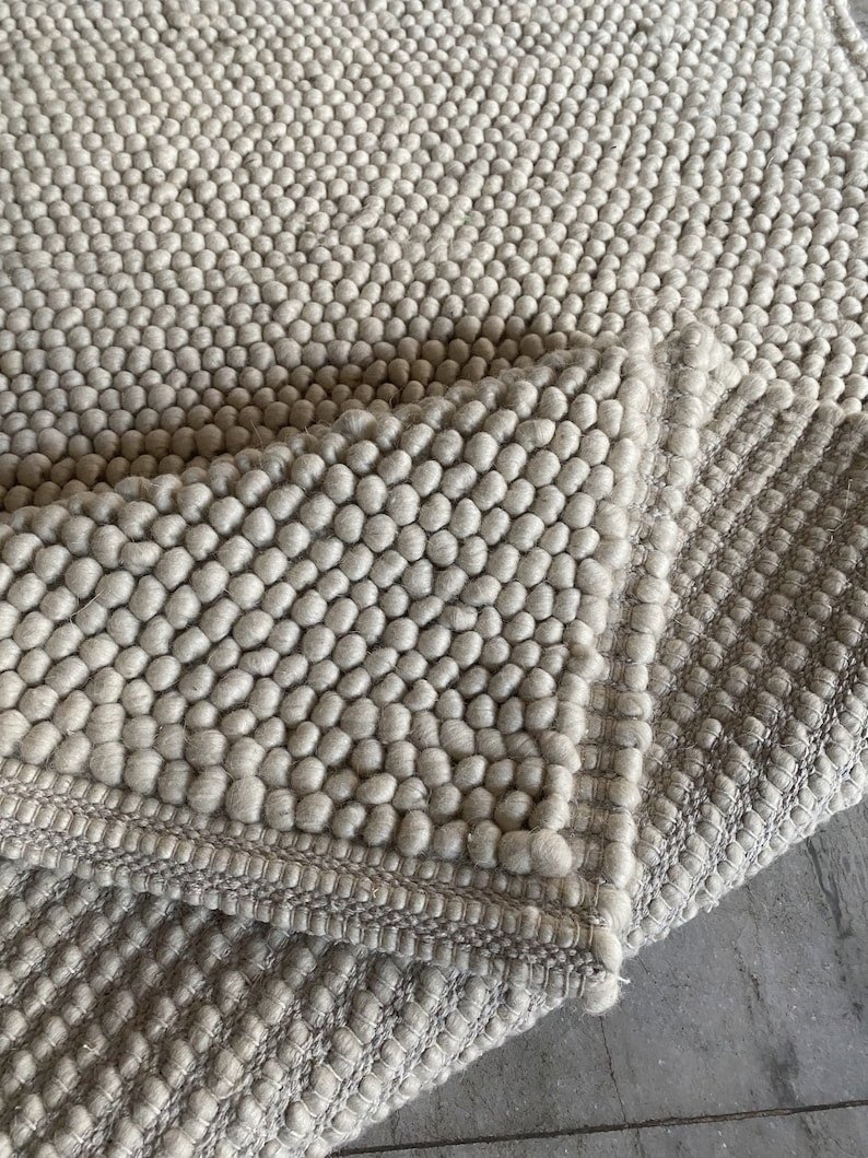 Bharatrug's tweet photo. Hand Woven Chunky Loop Wool Area Rug, Beige Cream Silver Colors Available, and Customization Available. - Bharat Rugs

#bharatrug a
#carpet  #woolrug #rug #NationFirst https://t.co/2fnUtK1TO2