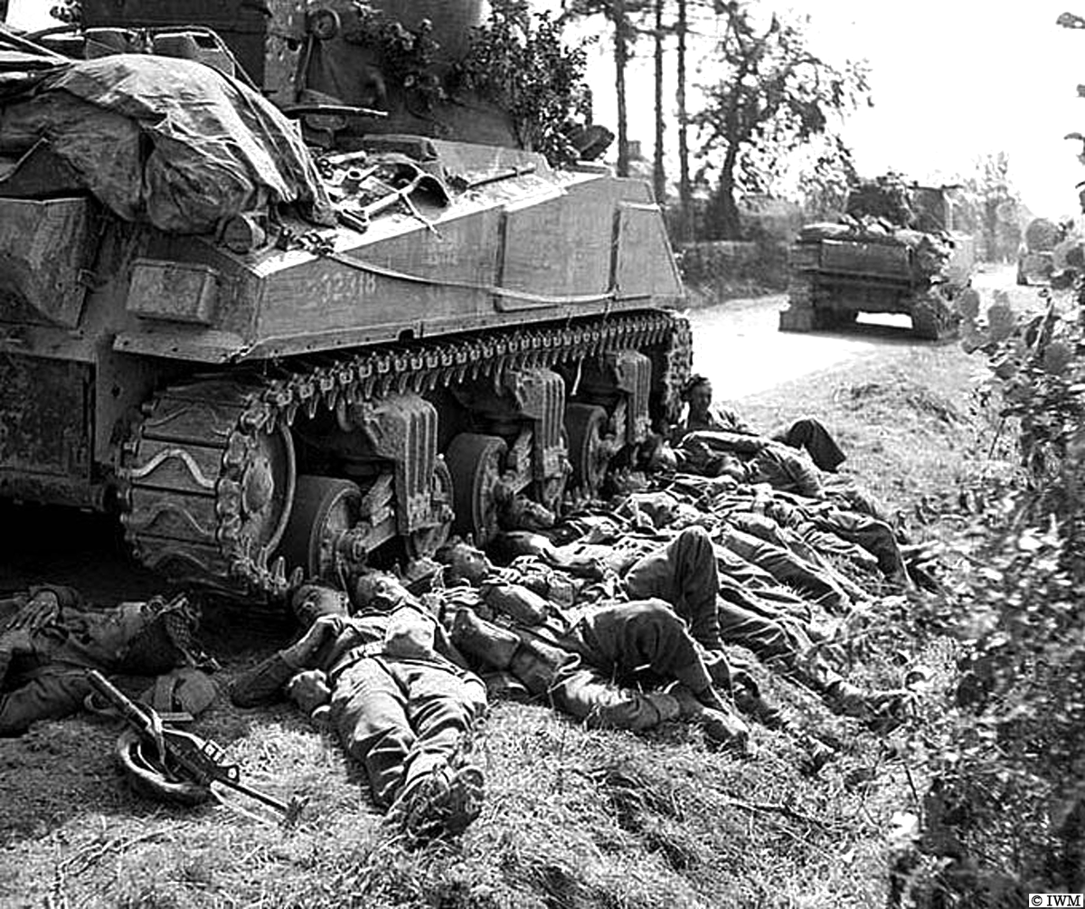 #OTD in 1944, Normandy. Men from the King's Shropshire Light Infantry resting next to a Sherman tank from 3 Royal Tank Regiment. #WW2 #HISTORY